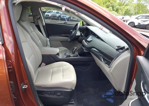 2019 Cadillac Xt4 Luxury from USA, damaged, VIN 1GYFZBR40KF209301